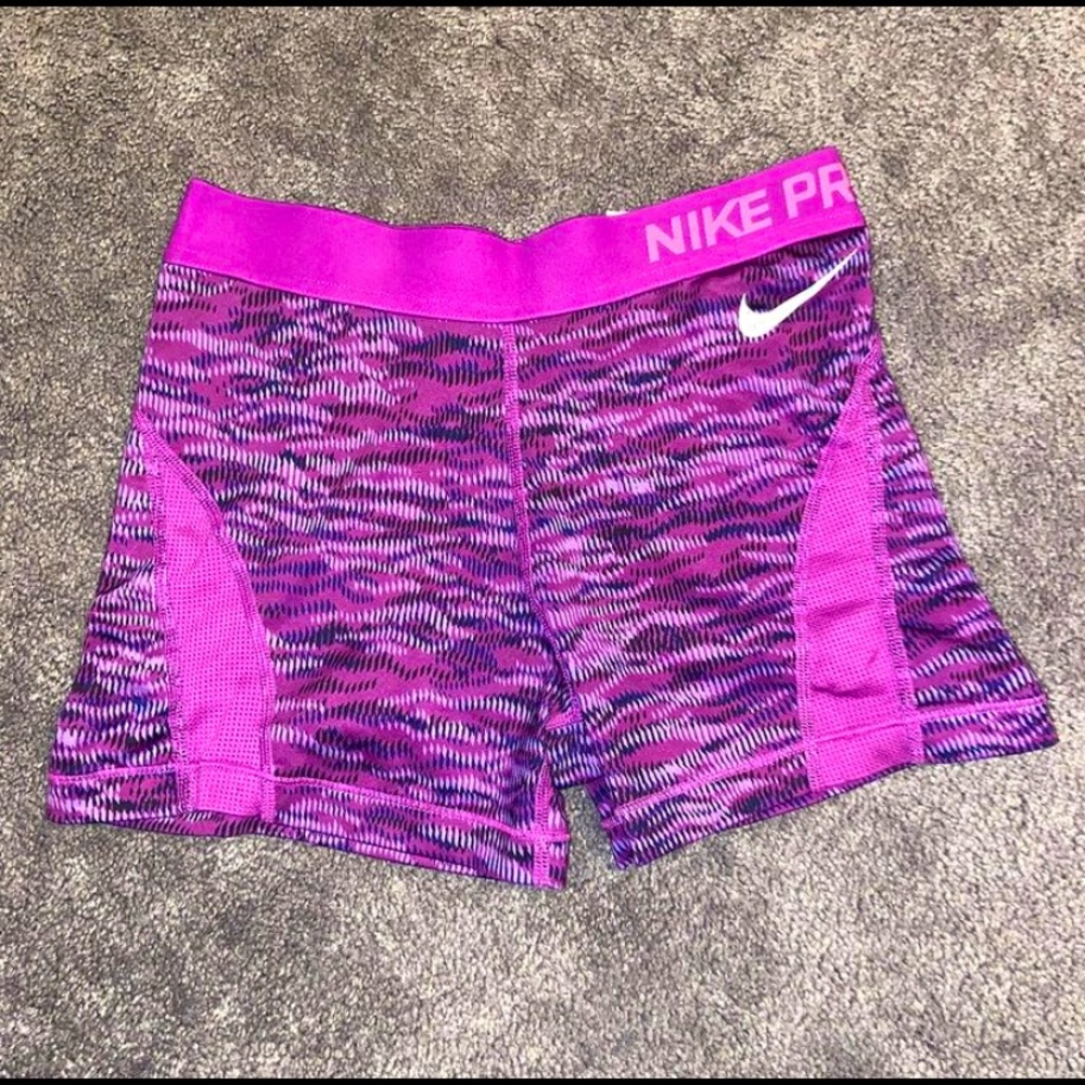 Purple nike pros.